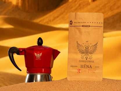 Close-up of Hëna organic decaf coffee ground for Moka pot, showcasing the chemical-free Mountain Water Process beans.