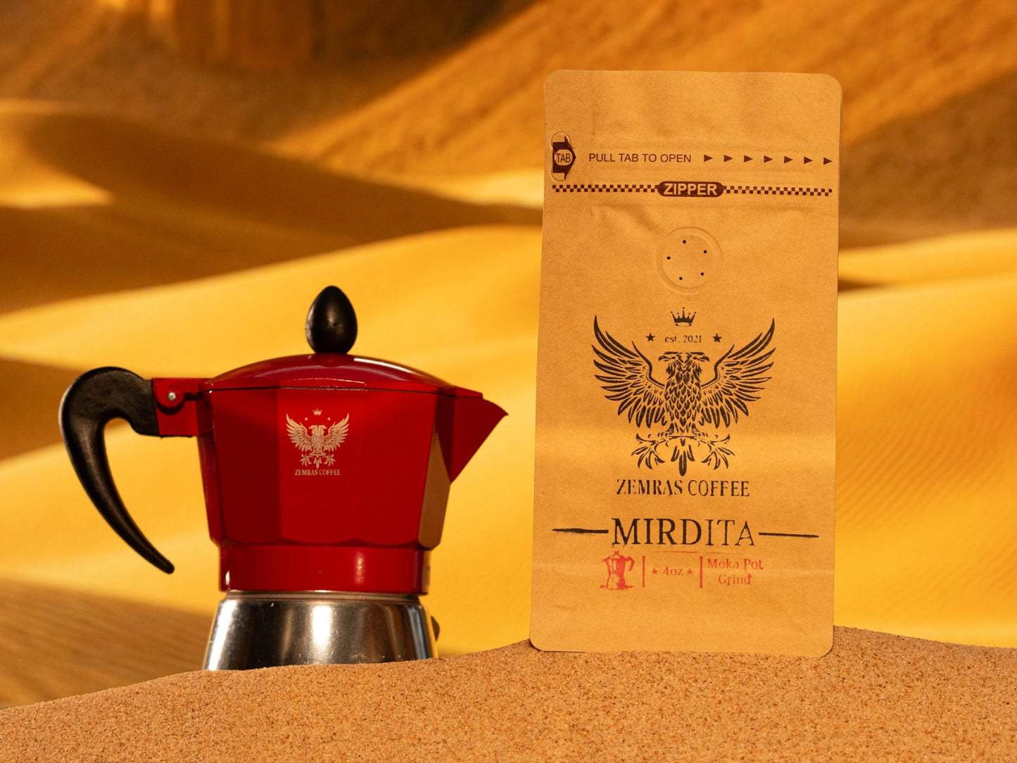 Close-up of Mirdita specialty coffee bag ground for Moka pot, featuring bold chocolaty notes and a fine grind size.