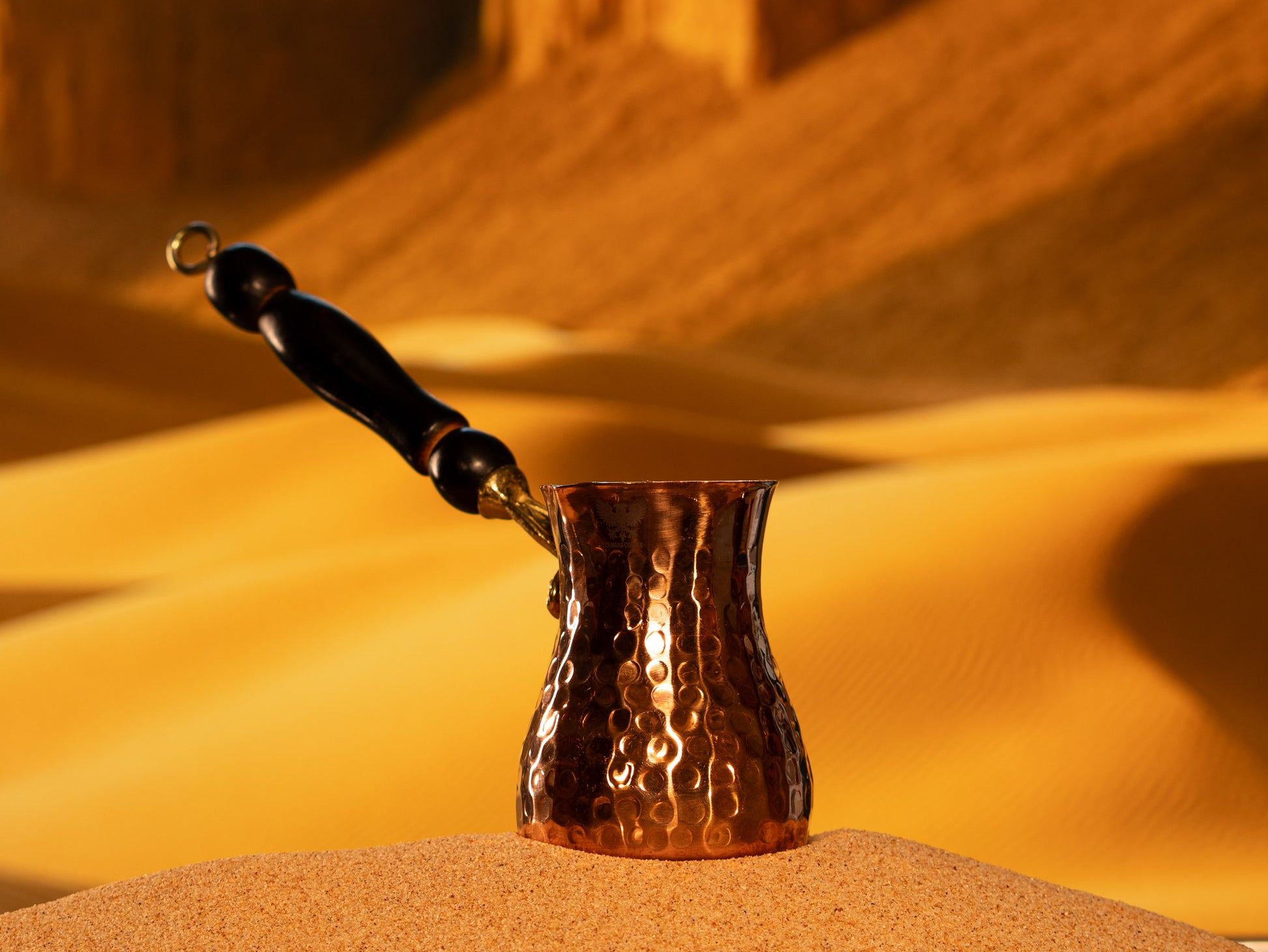 Side view of a 10-ounce heavy copper xhezve built for optimal heat retention and controlled boiling.